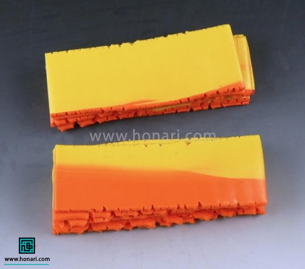 آموزش ساخت گل آفتابگردان با خمیر فیمو-مرحله 11 تکه های برش خورده رو روی هم میذاریم.