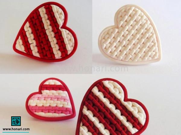 آموزش ساخت قلب به کمک تکنیک بافت با خمیر فیمو-مرحله 6 به هرز شکلی که خواستیم از جمله قلب میتوان کار را برش زد و نهایتا دورگیری کرد.شما می تونید این کار رو با رنگهای مختلف انجام بدین. شما میتونید آموزش ساخت عروسک خمیری را دنبال کنید و عروسک های و زیورآلات زیبا بسازید