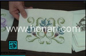 گلدوزی روی چرم با دست