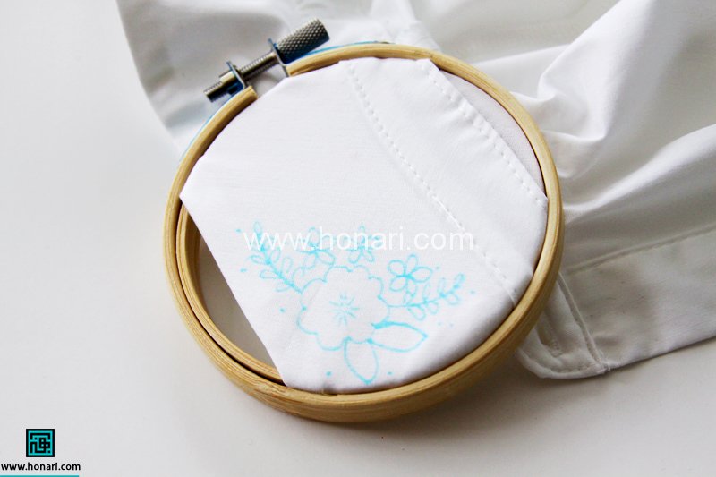 گلدوزی روی پارچه سفید